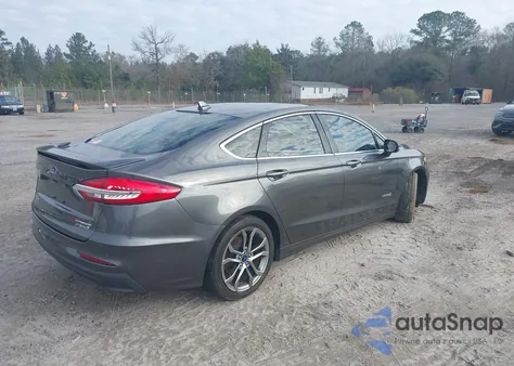 2019 Ford Fusion Hybrid Titanium from USA, damaged, VIN 3FA6P0RU6KR161988